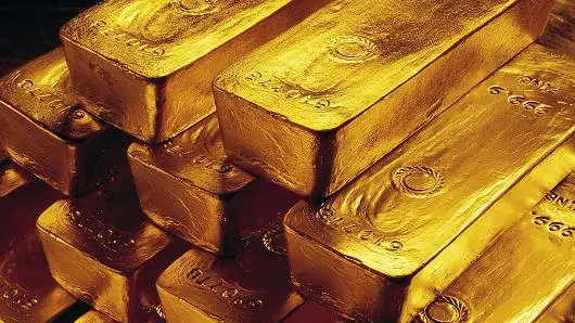 Stacked pure gold bars supplied from West Africa